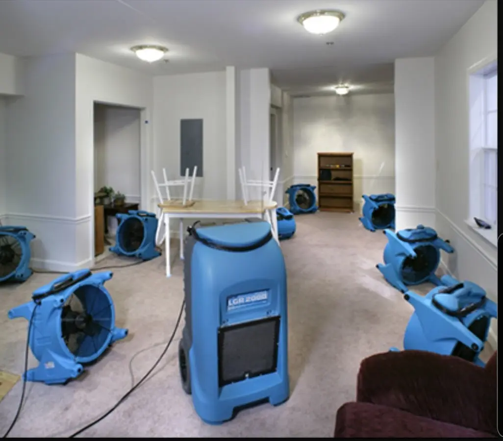 Air movers and dehumidifier setup for Water Damage Restoration in Rosenberg